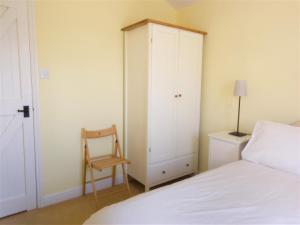 Wardrobe storage in bedroom 1.