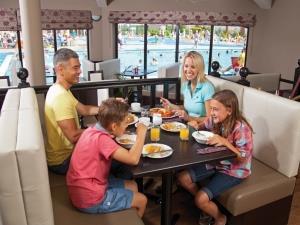 A family enjoy a delicious meal at Searles Leisure Resort in Hunstanton, west Norfolk.