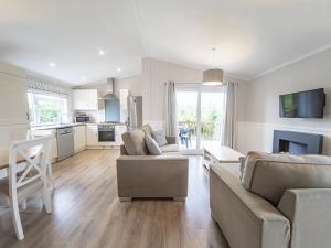 The living and dining space inside a caravan at Searles Leisure Resort in Hunstanton, west Norfolk.
