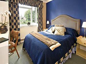 Stylish double bedroom inside Stuart House Hotel in west Norfolk.