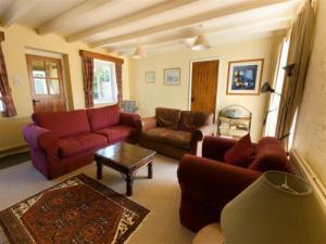 The sitting room has lovely beams