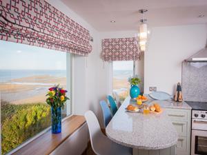 Self-catering unit including a kitchen inside The Old Lighthouse in Old Hunstanton, west Norfolk.