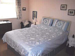 The main bedroom at Brook Bungalow in Hunstanton.