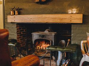Warm fireplace at The Gin Trap Inn, west Norfolk.