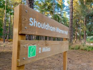 Outdoor sign for Shouldham Warren at Shouldham in west Norfolk.
