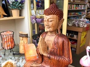 Unique hand carved Buddha at Crystal Cave and Serenity.