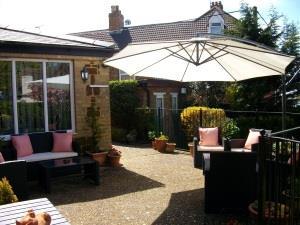 Outdoor seating area at Gate Lodge Guest House