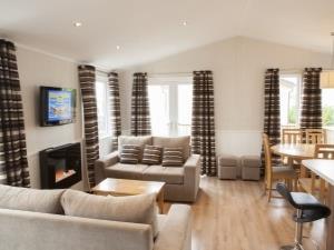 The living and dining space inside a caravan at Searles Leisure Resort in Hunstanton, west Norfolk.