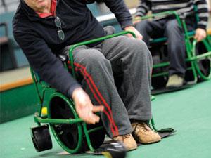 A man in a wheelchair playing bowls at Alive Lynnsport Leisure Park in King's Lynn/