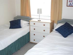 A twin bedroom inside Midway, Hunstanton.