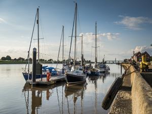 Boats moored alongside King's Lynn's riverside in west Norfolk.