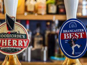 Drinks on tap at The Jolly Sailors in Brancaster, west Norfolk.