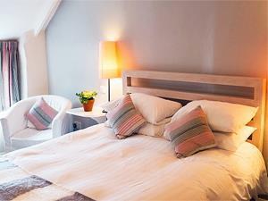 One of the comfy bedrooms inside The Rose & Crown in west Norfolk.