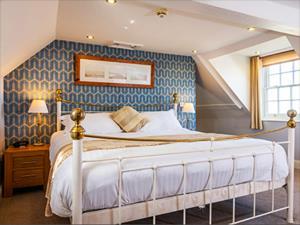 Stylish double bedroom at The Lodge Hotel and Bar in Hunstanton, west Norfolk.