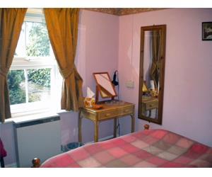 Bedroom inside Foxes Croft in west Norfolk.