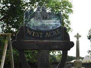 The village sign at West Acre in west Norfolk.