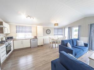 The living and dining space inside a caravan at Searles Leisure Resort in Hunstanton, west Norfolk.