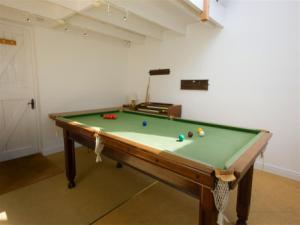 Games room with snooker table.