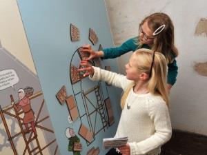 Children learning about Castle Acre Priory.