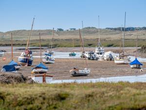 Boats moored at Brancaster Staithe, West Norfolk.