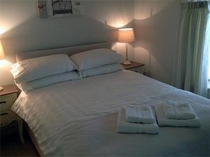 One of the cottage's comfortable bedrooms