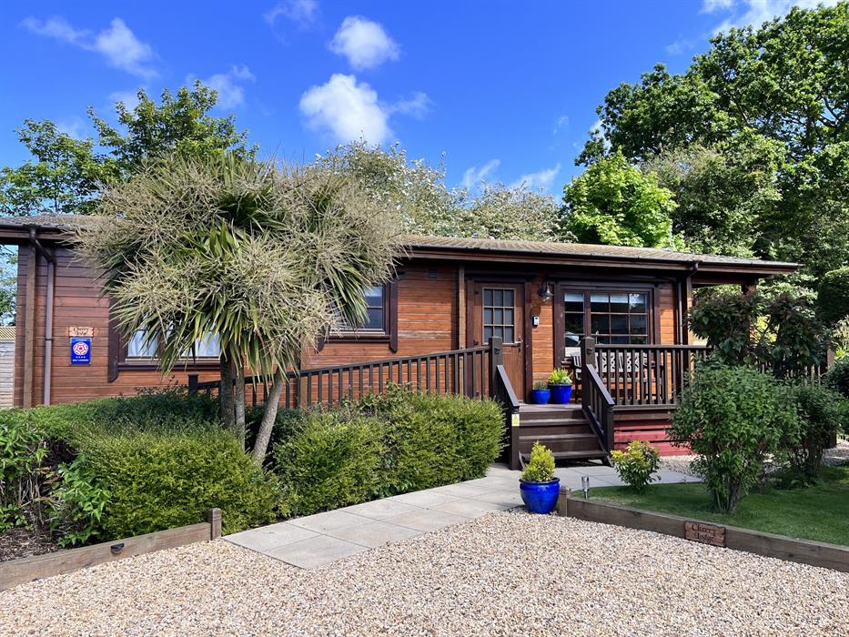 Spacious three bedroom log cabin sleeping 5, one double bedroom, one twin and a single. Access ramp. Situated in the village of Heacham.