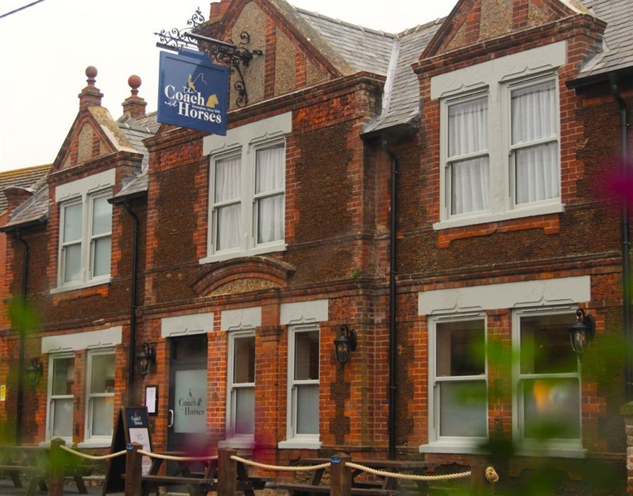 Front view of Coach and Horses pub and hotel