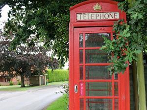 Red telephone box in the tranquil village of North Runcton, west Norfolk.