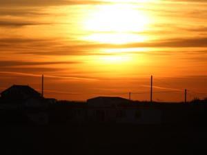 a beautiful sunset view from our West Norfolk coastline campsite