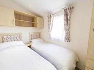 Twin bedroom inside a caravan at Searles Leisure Resort in Hunstanton, west Norfolk.