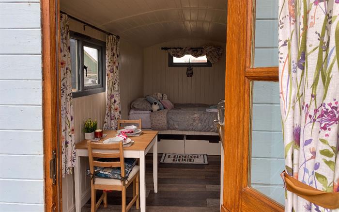 a sneak peek inside out glamping shepherds huts, country chic and very comfortable, just a 2 minute walk from the beach