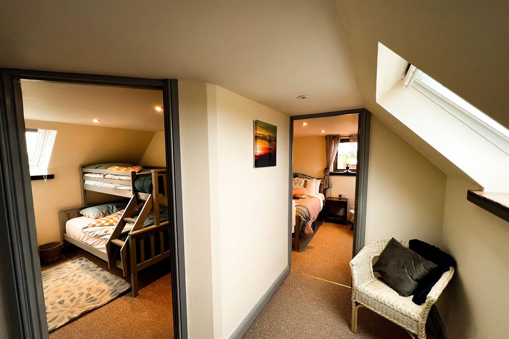 upstairs landing with a sea view in the dairy