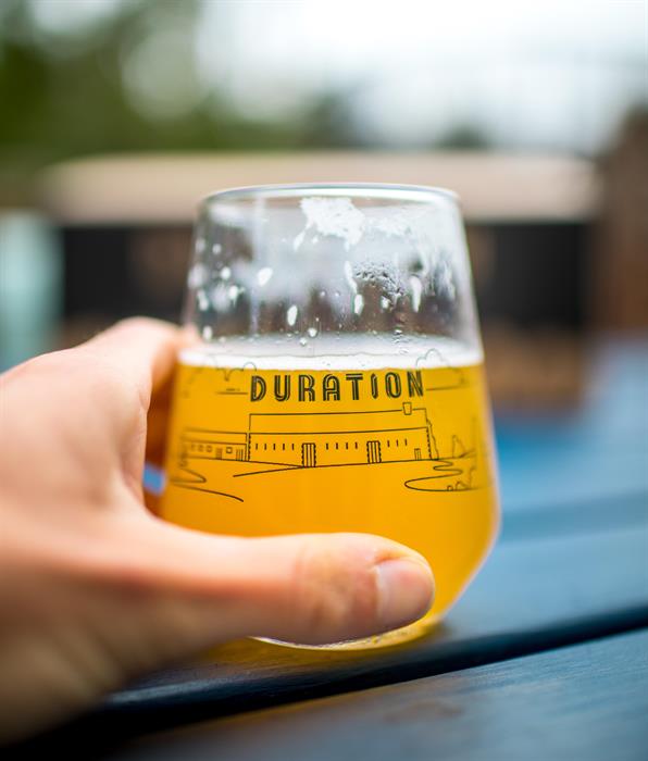 A brewery location glass with Turtles All The Way Down, IPA