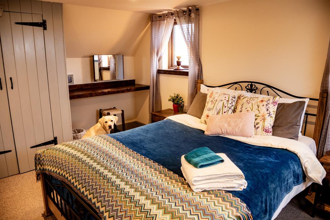 master bedroom in the dairy